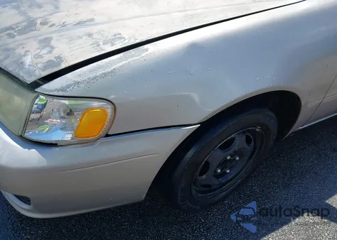 2001 Toyota Corolla Ce z USA, uszkodzony, nr VIN 1NXBR12E71Z522806